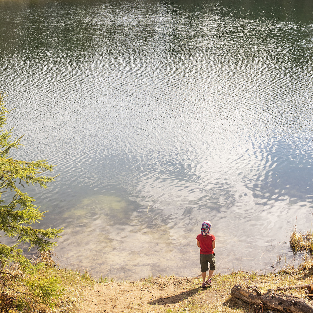 standing near lake