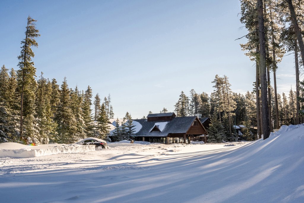 picture of The Resort at Cypress Hills hotel entrance with lots of snow around
